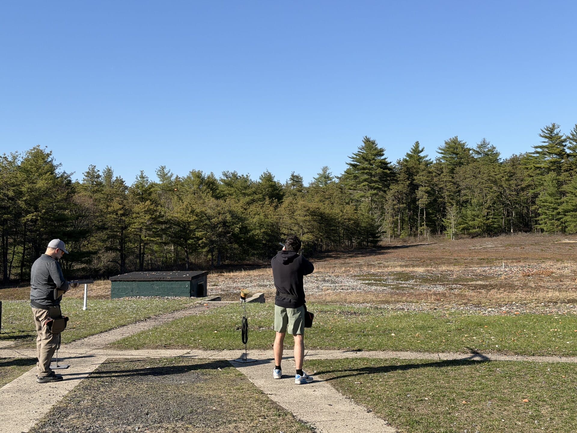 Skeet station · clay in flight